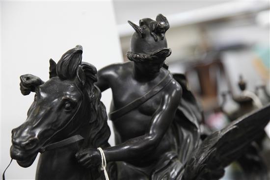 After Antoine Coysevox. A patinated bronze group of Mercury riding Pegasus, 24.5in.